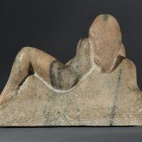 Marble carving of a reclining nude woman