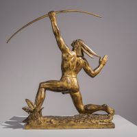 Alt text: Bronze sculpture of a Native American kneeling on one knee and shooting an arrow up into the sky