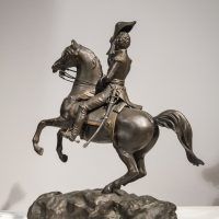 Alt text: Bronze sculpture of Andrew Jackson on a horse with its front legs lifted off the ground