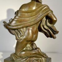 Alt text: Bronze sculpture of a muse