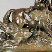 Alt text: Bronze sculpture of a Horseman Hunting Boars
