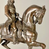 Alt text: Bronze sculpture of Napoleon on horseback