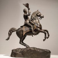 Alt text: Bronze sculpture of Andrew Jackson on a horse with its front legs lifted off the ground