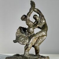 Alt text: Bronze sculpture of a dancing couple