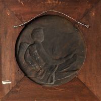 Alt text: Bronze bas relief of Robert Louis Stevenson, verso
