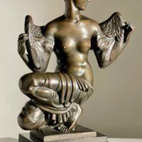 Alt text: Bronze sculpture of Philomela from Greek mythology, kneeling with wings growing from her back
