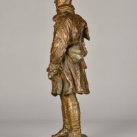Alt text: Bronze sculpture of a standing soldier