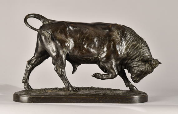 Alt text: Bronze sculpture of a bull with his head down and front right leg lifted, side view