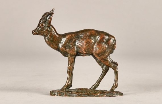 Alt text: Small bronze sculpture of a standing Kevel, or gazelle