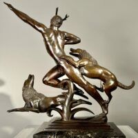 Alt text: Bronze sculpture of Actaeon with dogs, back