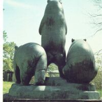 Alt text: Outdoor sculpture of three bears