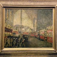 Alt text: Painting of a city street scene with double decker buses and pedestrians crossing the road, framed
