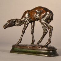 Alt text:Bronze sculpture of a scared fawn, angled view