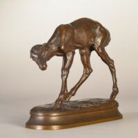 Alt text: Bronze sculpture of a young fawn
