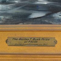 Alt text: Detail of plate on city painting frame that reads 