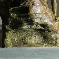 Alt text: Bronze sculpture of a horse bending down alongside a girl sitting near to the ground, peering over a cliff (title detail)