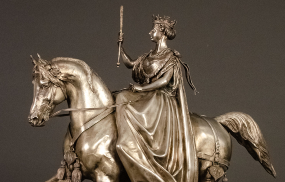 Alt text: Silvered bronze sculpture of Queen Victoria on a horse