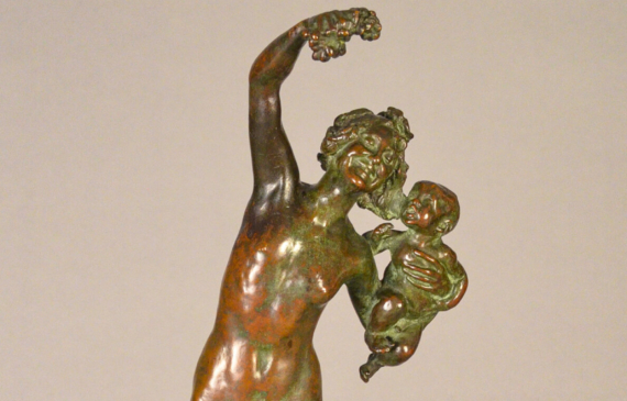 Alt text: Bronze sculpture of Bacchante