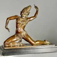 Alt text: Bronze sculpture of a female dancer