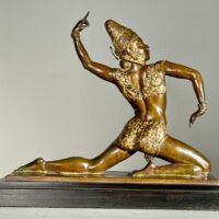 Alt text: Bronze sculpture of a female dancer