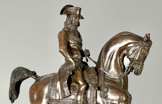 Alt text: Bronze sculpture of Napoleon on horseback