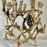 Alt text: Abstract metal sculpture, detail