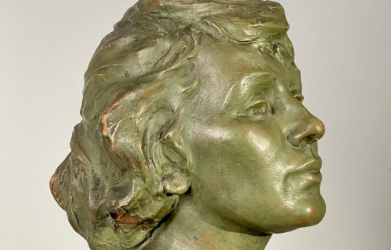 Alt text: Sculpture of a woman's face