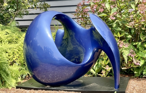 Alt text: dark blue outdoor sculpture