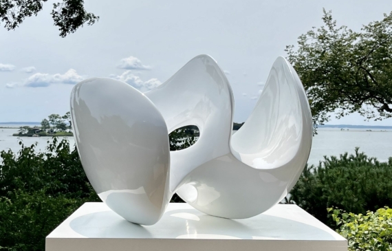 Alt text: glossy, oval shaped sculpture