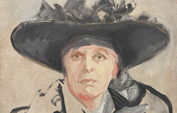 Alt text: Portrait of a woman with a wide-brimmed hat