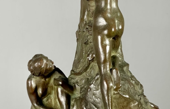 Alt text: Bronze lamp base with female figures